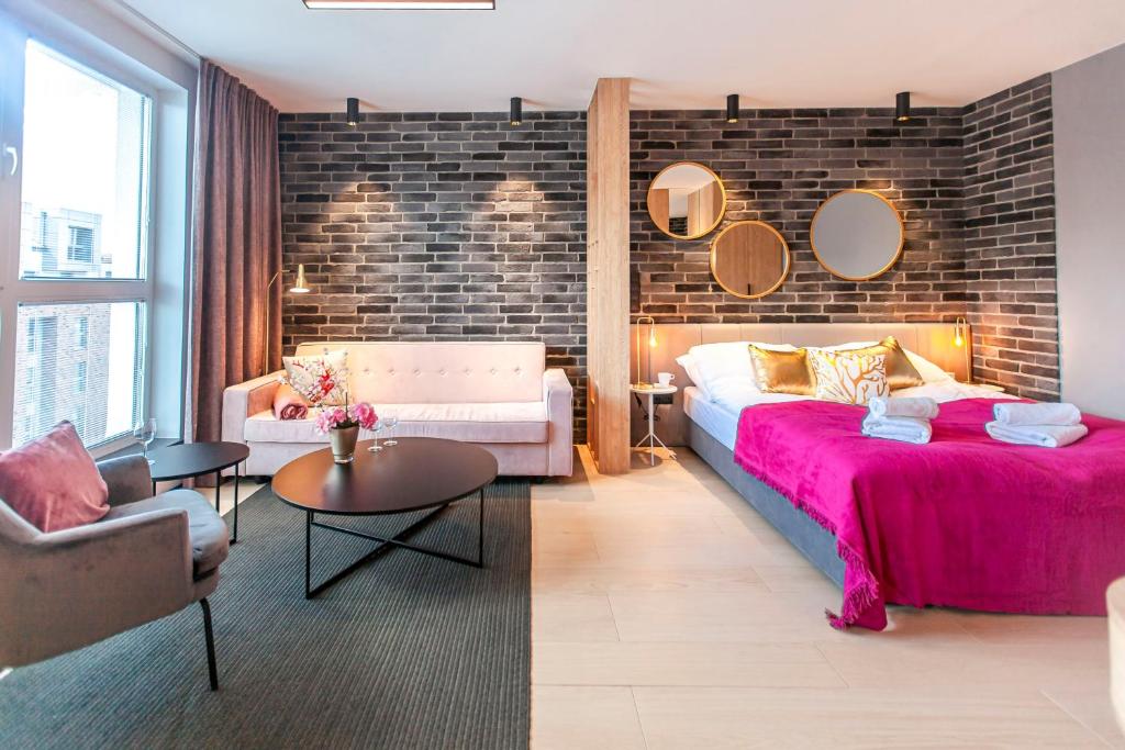 Posteľ alebo postele v izbe v ubytovaní Megi & Greg Apartments