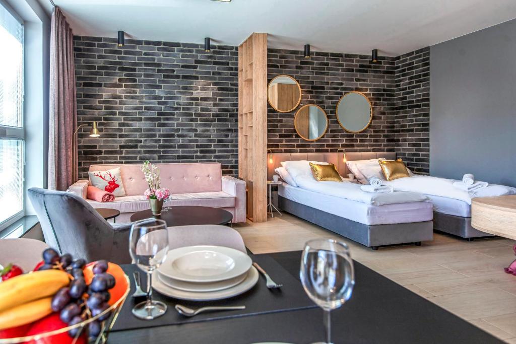 Posteľ alebo postele v izbe v ubytovaní Megi & Greg Apartments