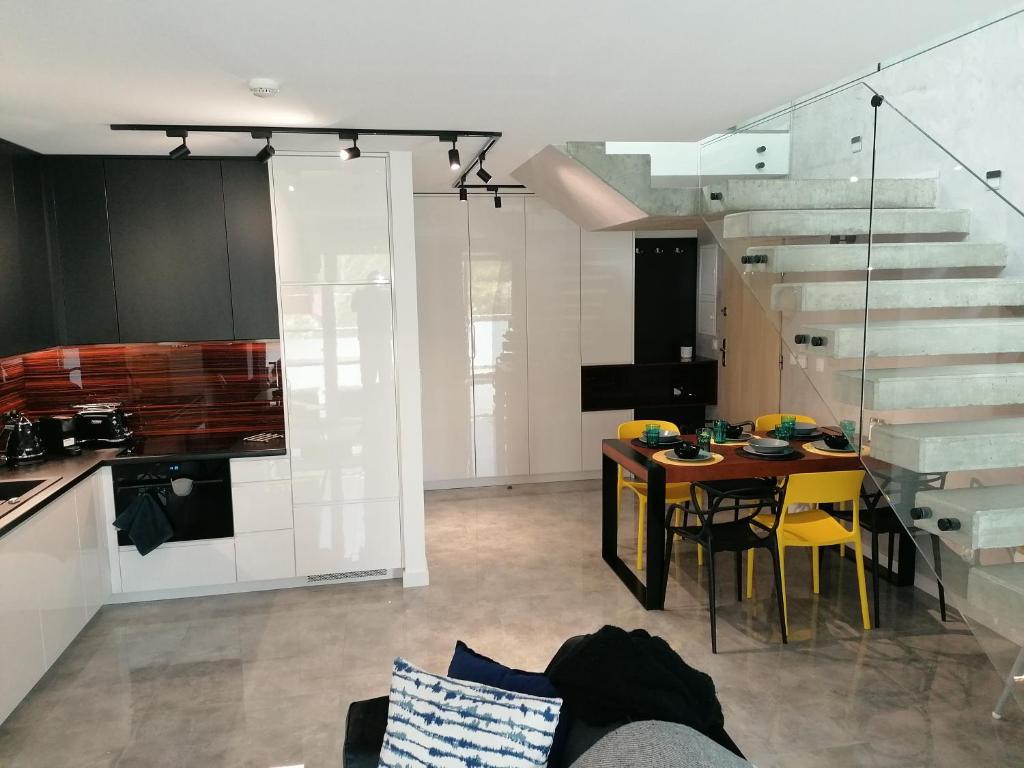 Η κουζίνα ή μικρή κουζίνα στο WYGODA Apartamenty