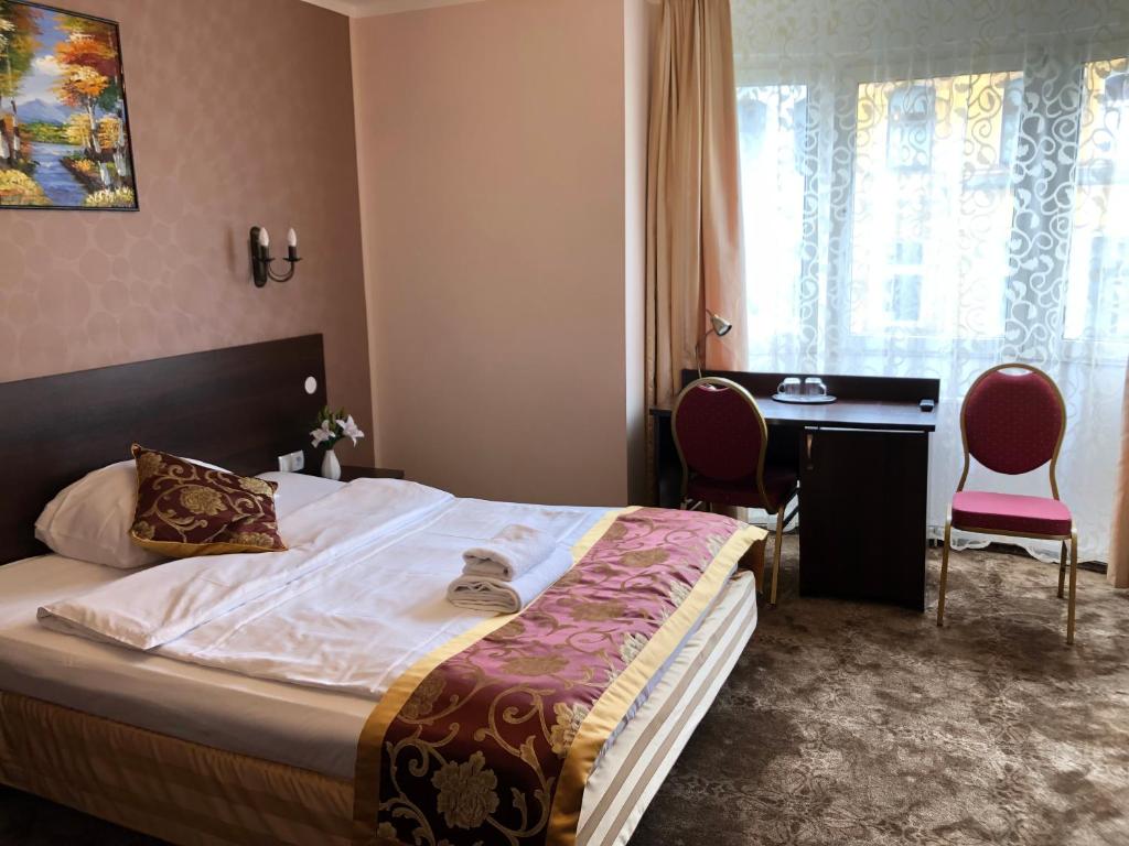 Postel nebo postele na pokoji v ubytování Atlas Berlin Hotel