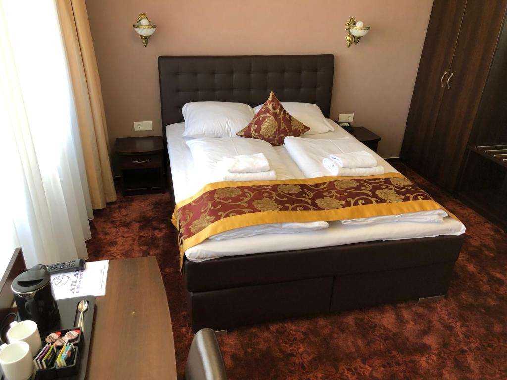 Postel nebo postele na pokoji v ubytování Atlas Berlin Hotel