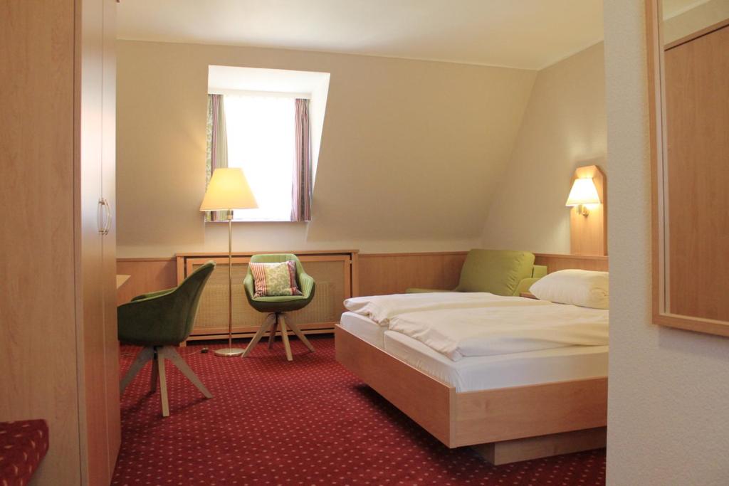 Posteľ alebo postele v izbe v ubytovaní Alte Nagelschmiede