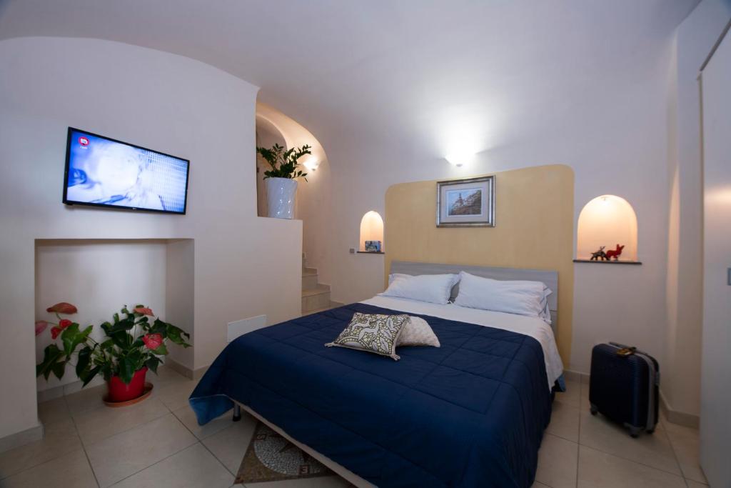 En eller flere senger på et rom på Alfieri Rooms - Luna - Amalfi Coast