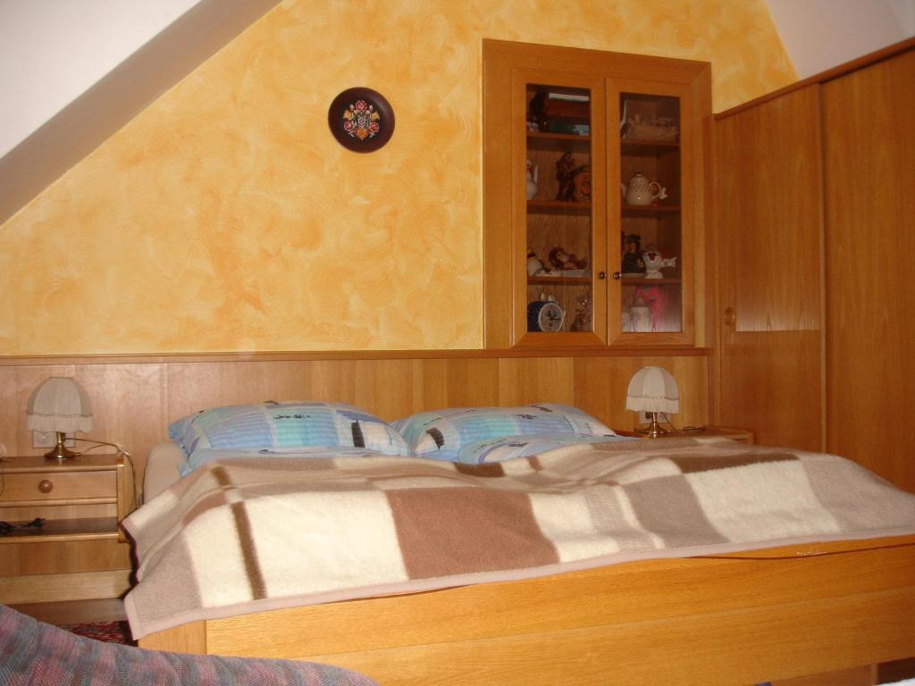 Postel nebo postele na pokoji v ubytování Apartment Janschitz Gundersheim