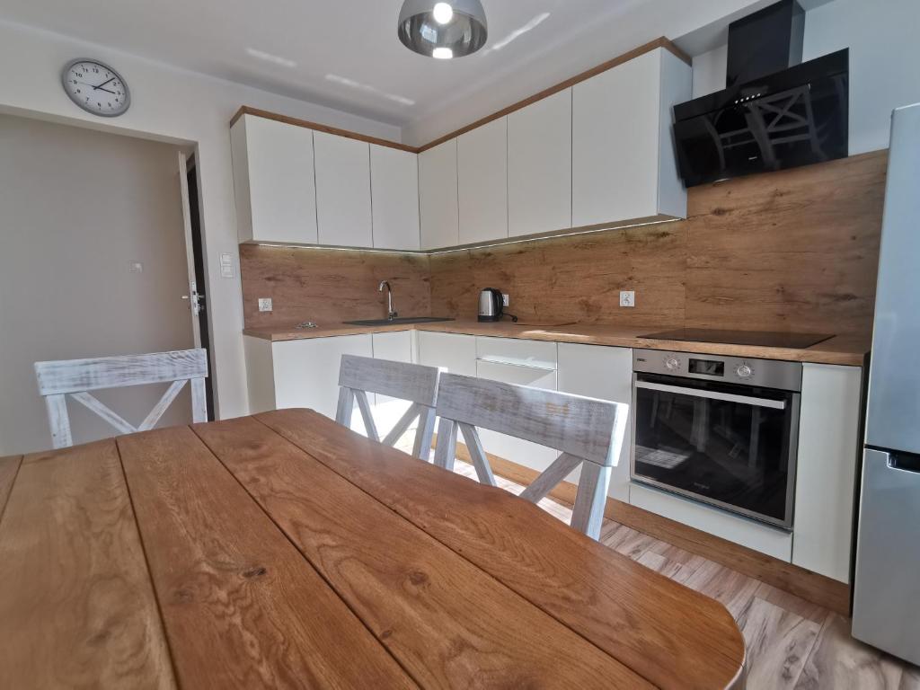 Kuchyňa alebo kuchynka v ubytovaní Apartament KAKADU