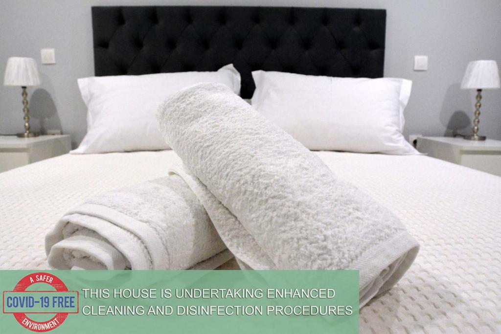 מיטה או מיטות בחדר ב-Liston Apartment