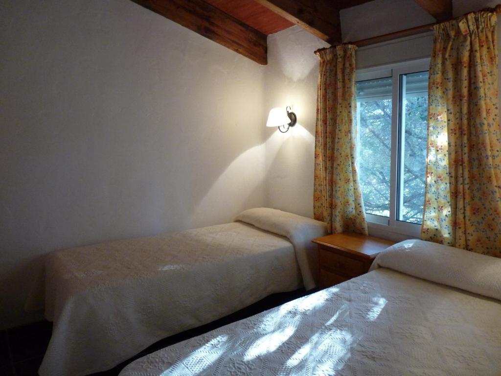 A bed or beds in a room at Casas Isabel