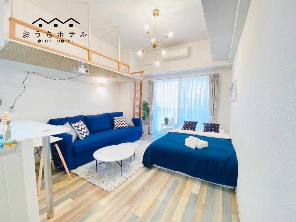Tempat tidur dalam kamar di OUCHI HOTEL Otemachi