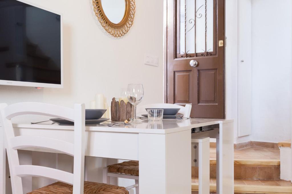 Televízia a/alebo spoločenská miestnosť v ubytovaní L'Havanera Boutique Home