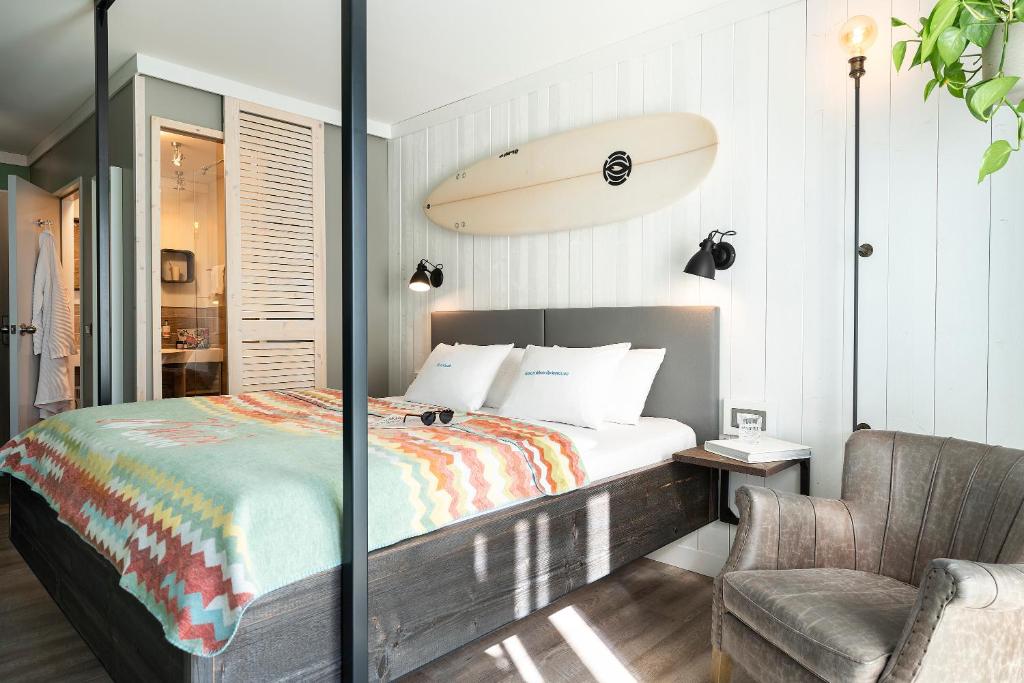 Postel nebo postele na pokoji v ubytování Beach Motel St. Peter-Ording