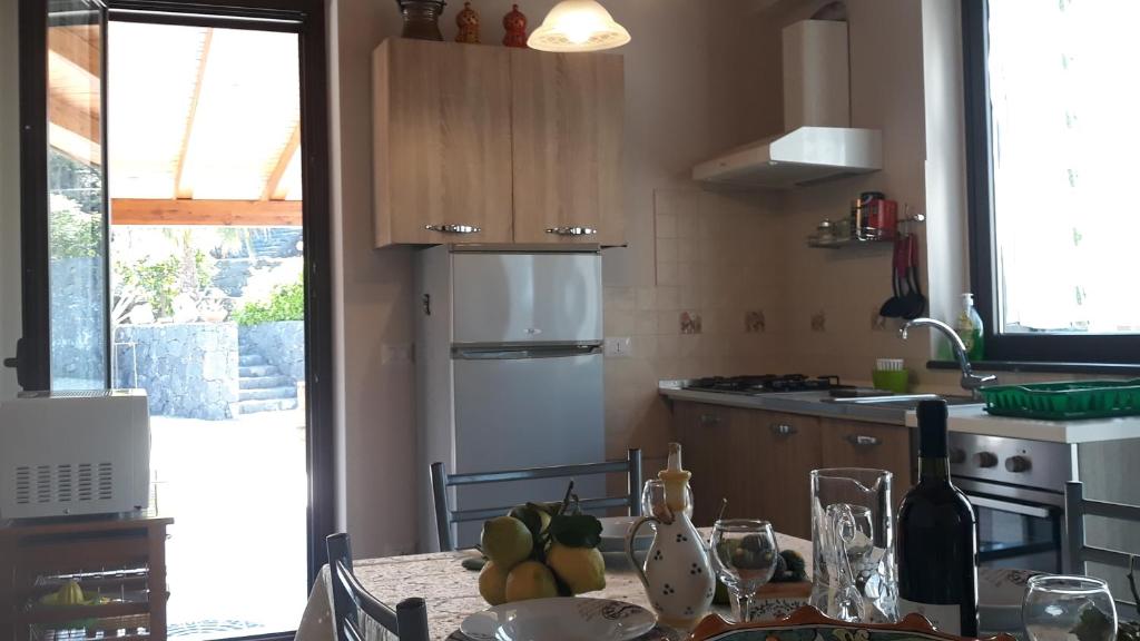 Kuchyňa alebo kuchynka v ubytovaní Profumo di Zagara Acireale