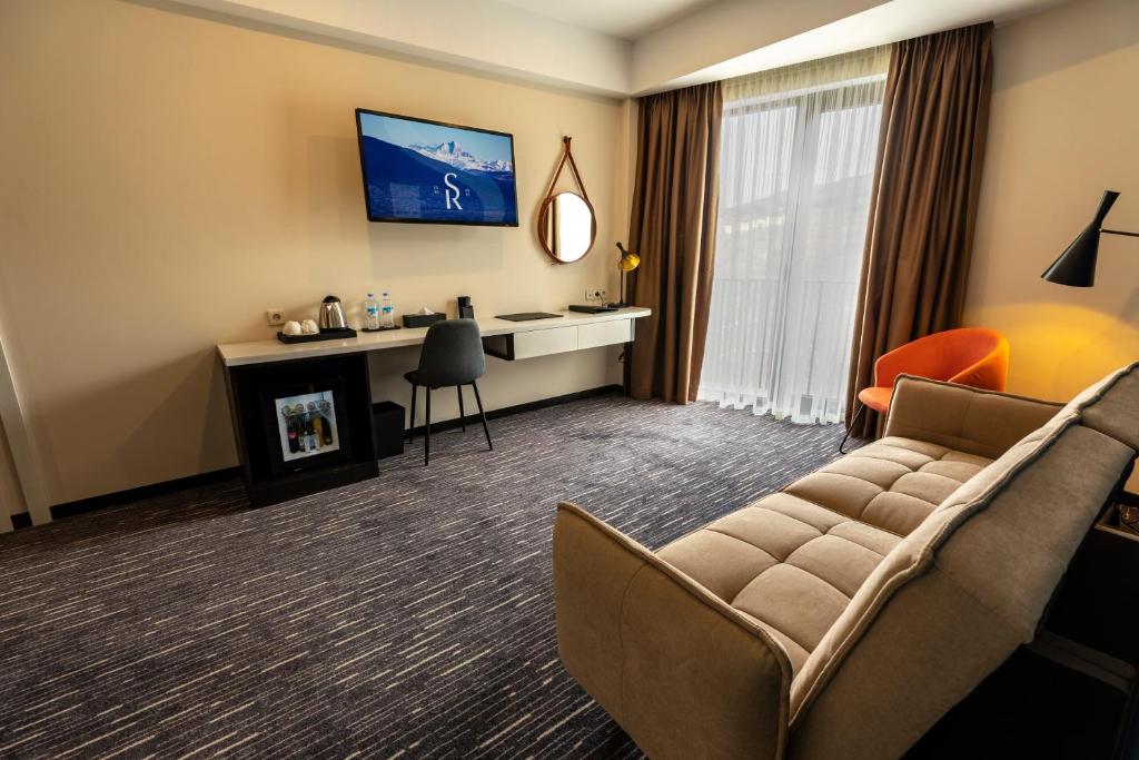 TV a/nebo společenská místnost v ubytování Sevsamora Resort & Spa