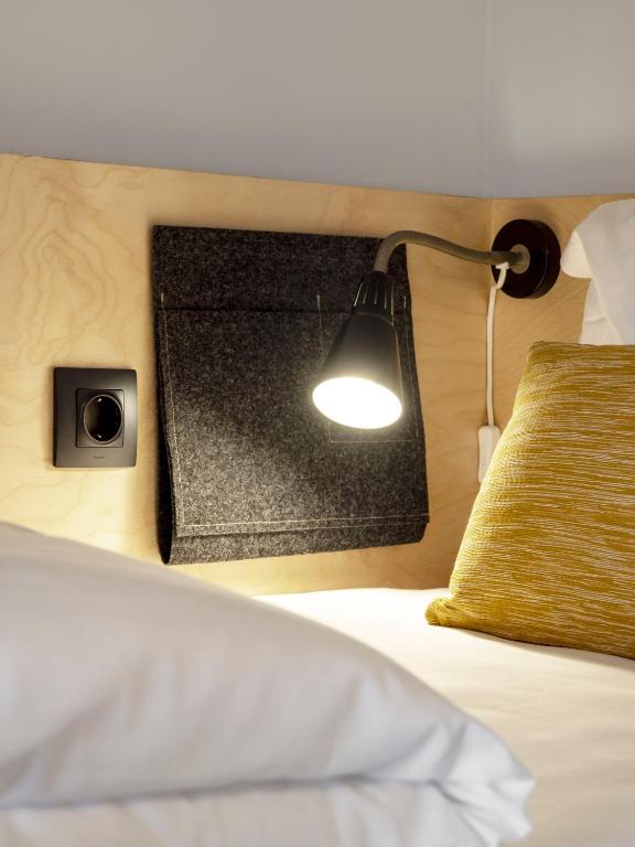 Postel nebo postele na pokoji v ubytování Penedo da Saudade Suites & Hostel