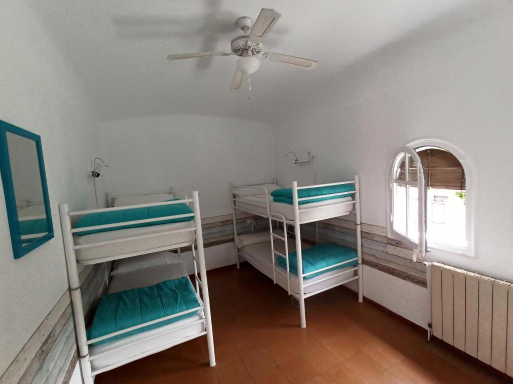 Postel nebo postele na pokoji v ubytování Can Cocollona