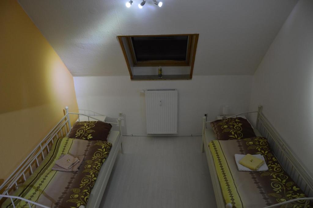 Postel nebo postele na pokoji v ubytování Apartment Hildesheim