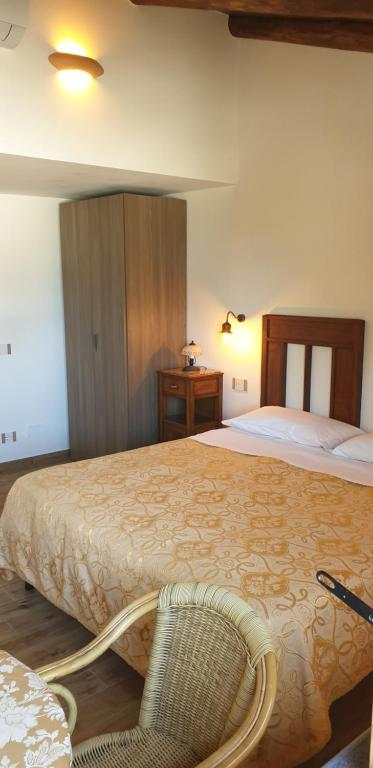 Postel nebo postele na pokoji v ubytování Agriturismo Mare e Monti