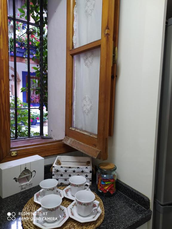 Coffee and tea making facilities at Alojamiento casa típica de Córdoba