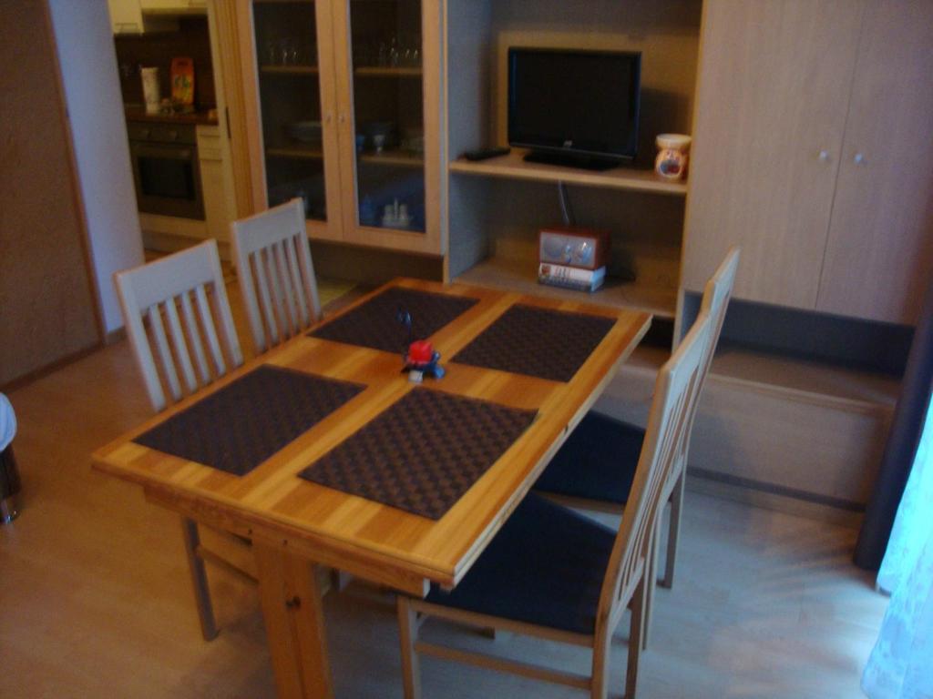 A television and/or entertainment centre at Apartment Alena - include Jokercard