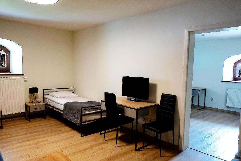Posteľ alebo postele v izbe v ubytovaní Hotel Spichlerz Pierwszy SPA & WELLNESS