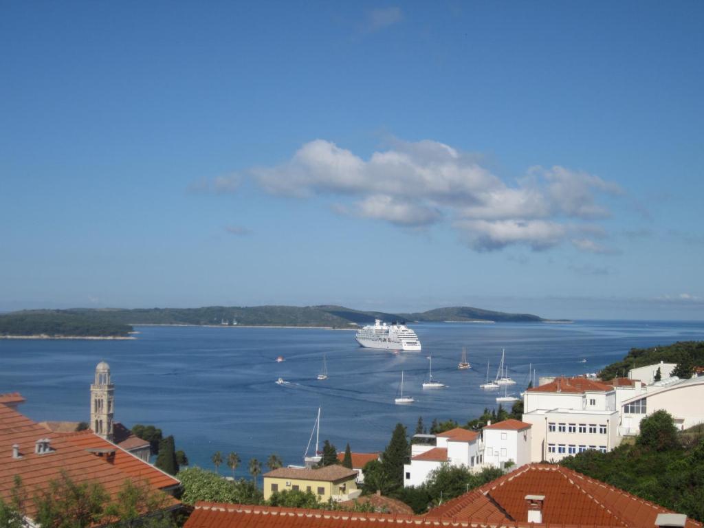 a view of a harbor with boats in the water at Apartments Kresic in Hvar