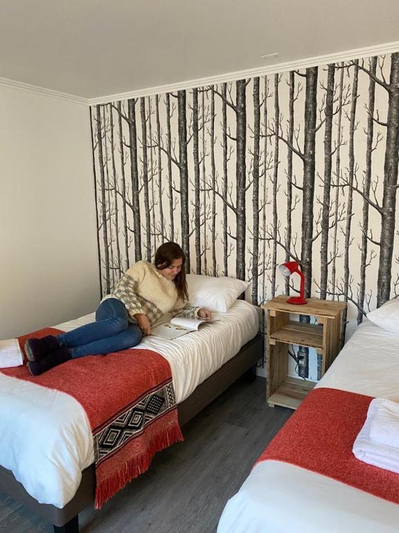 Letto o letti in una camera di Rumbo Suites