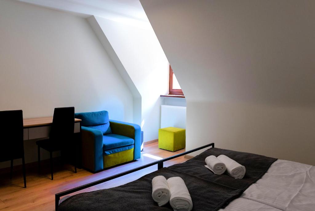 Posteľ alebo postele v izbe v ubytovaní Hotel Spichlerz Pierwszy SPA & WELLNESS