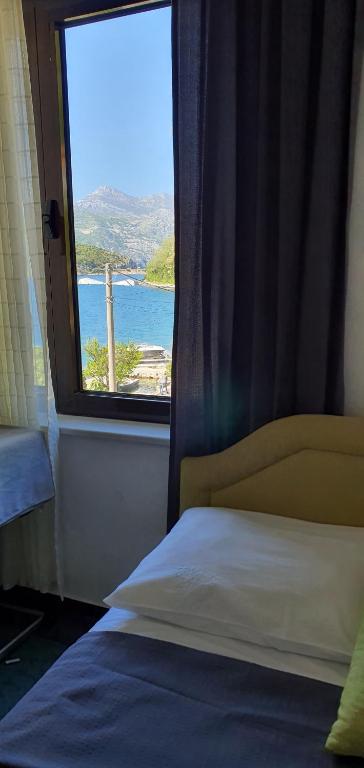 Postel nebo postele na pokoji v ubytování Apartments MaXhit