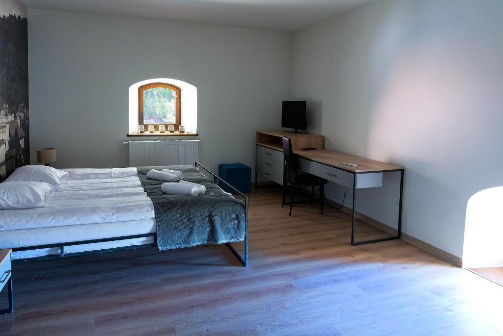 Posteľ alebo postele v izbe v ubytovaní Hotel Spichlerz Pierwszy SPA & WELLNESS