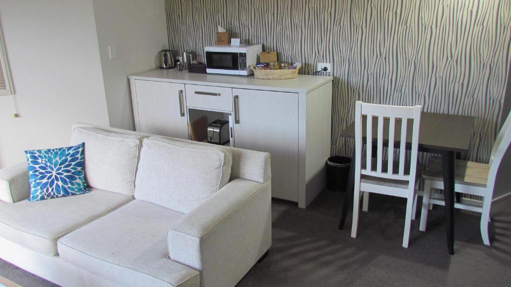 A kitchen or kitchenette at Tongariro Suites