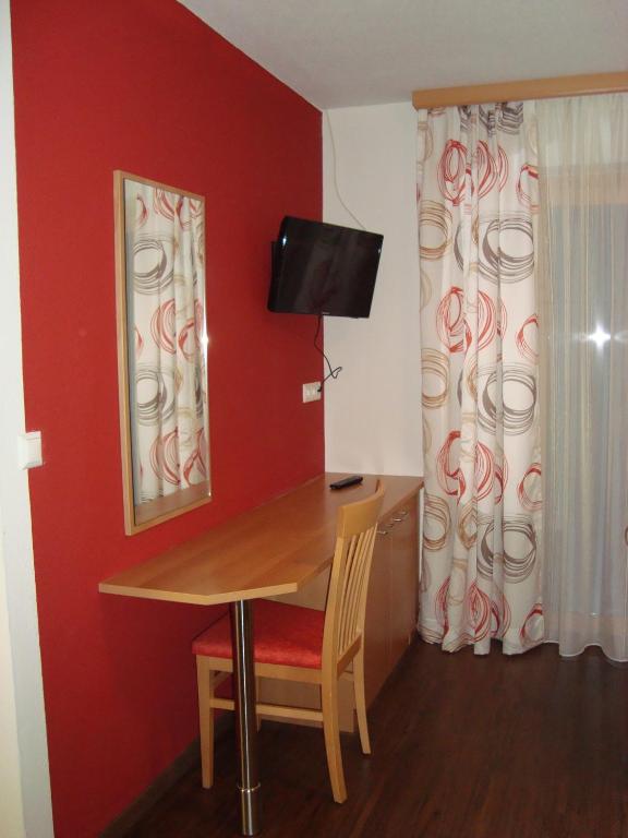 TV a/nebo společenská místnost v ubytování Haus Harmonika