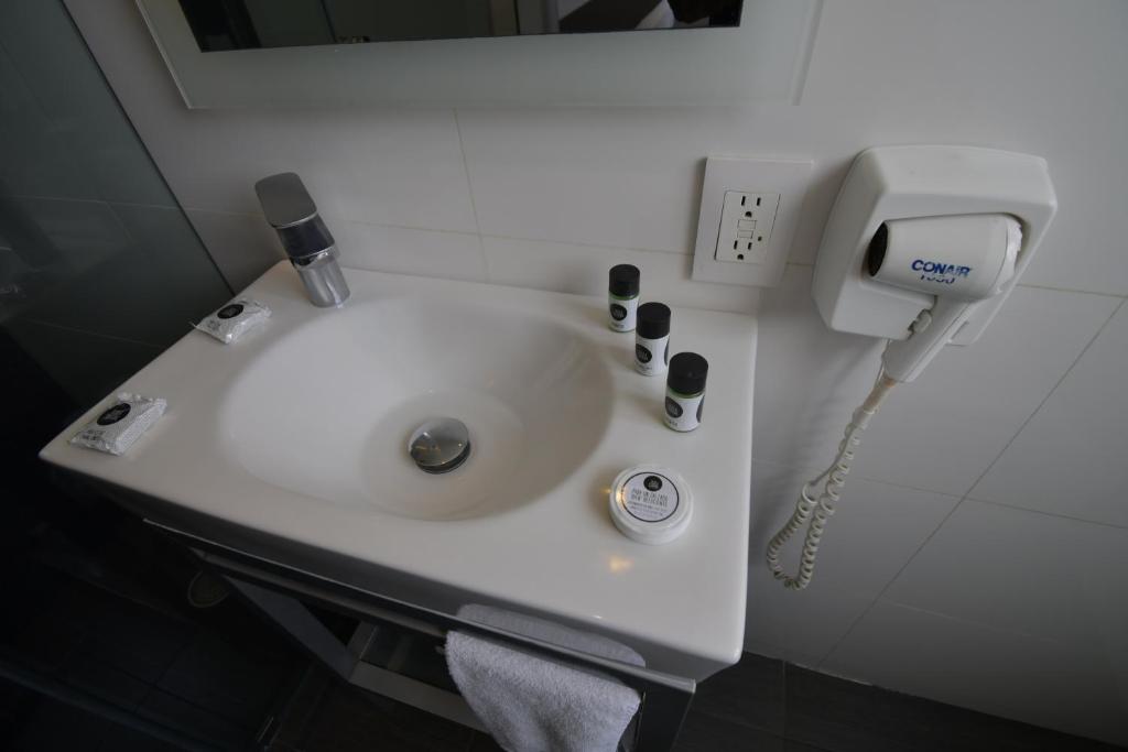 Koupelna v ubytování Hotel Perla Central