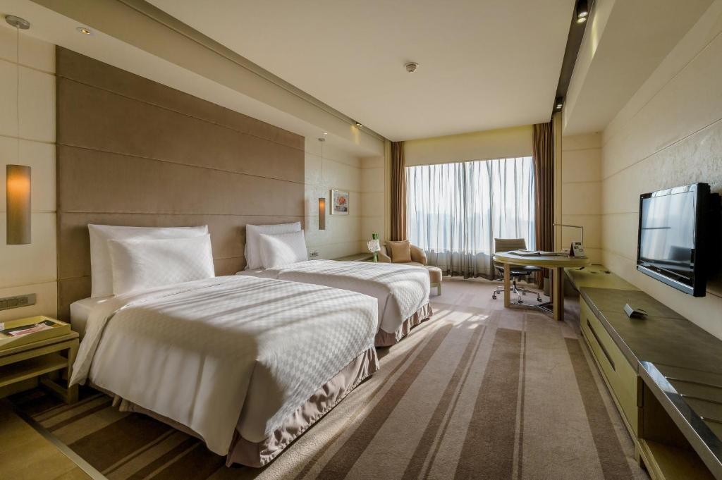 TV a/nebo společenská místnost v ubytování Hotel Nikko Saigon