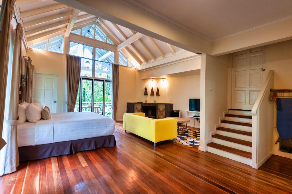 Letto o letti in una camera di Sutera Sanctuary Lodges At Kinabalu Park