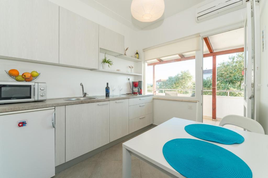 Kuchyňa alebo kuchynka v ubytovaní Apartments Keran