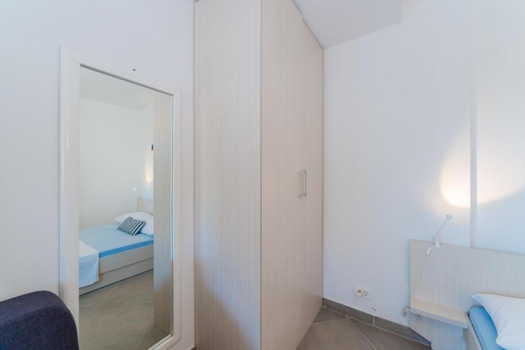 Posteľ alebo postele v izbe v ubytovaní Apartments Keran