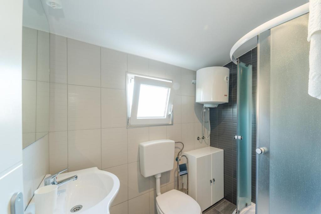 Kúpeľňa v ubytovaní Apartments Keran