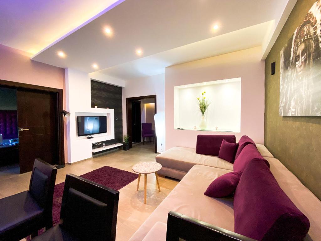 TV a/nebo společenská místnost v ubytování RESIDENCE Apartments