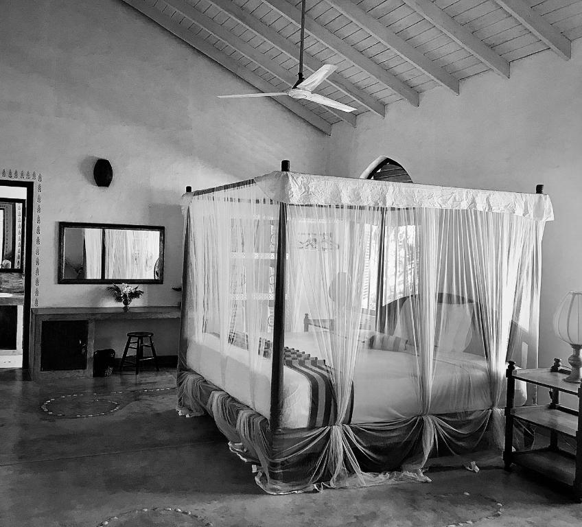 TV a/nebo společenská místnost v ubytování Khomba Beach House