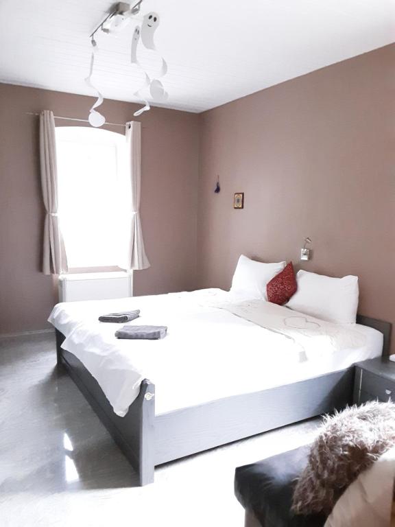 Posteľ alebo postele v izbe v ubytovaní Apartment House Seerose