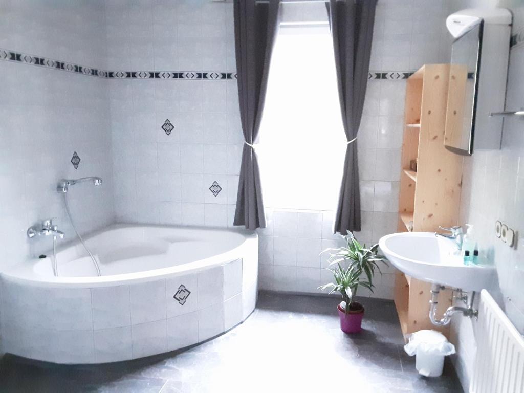 Kúpeľňa v ubytovaní Apartment House Seerose