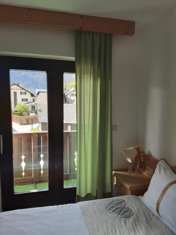 Posteľ alebo postele v izbe v ubytovaní Apartment House Seerose