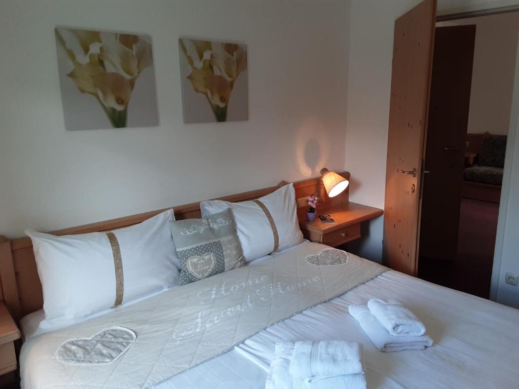 Posteľ alebo postele v izbe v ubytovaní Apartment House Seerose