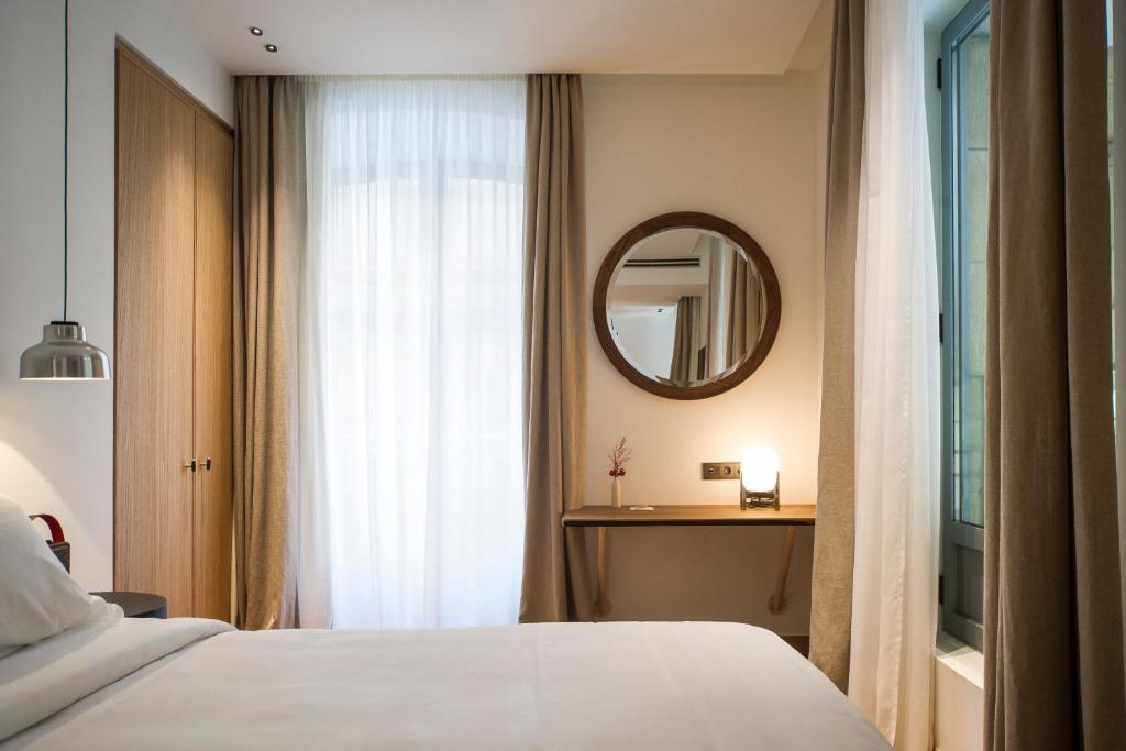 Postel nebo postele na pokoji v ubytování Hotel Arbaso