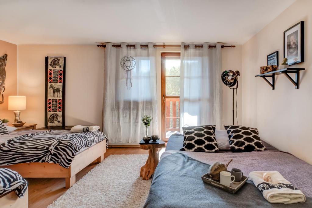 Postel nebo postele na pokoji v ubytování Africa House