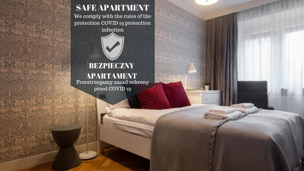 Postel nebo postele na pokoji v ubytování Apartment Nearto Old Town Daszyńskiego street