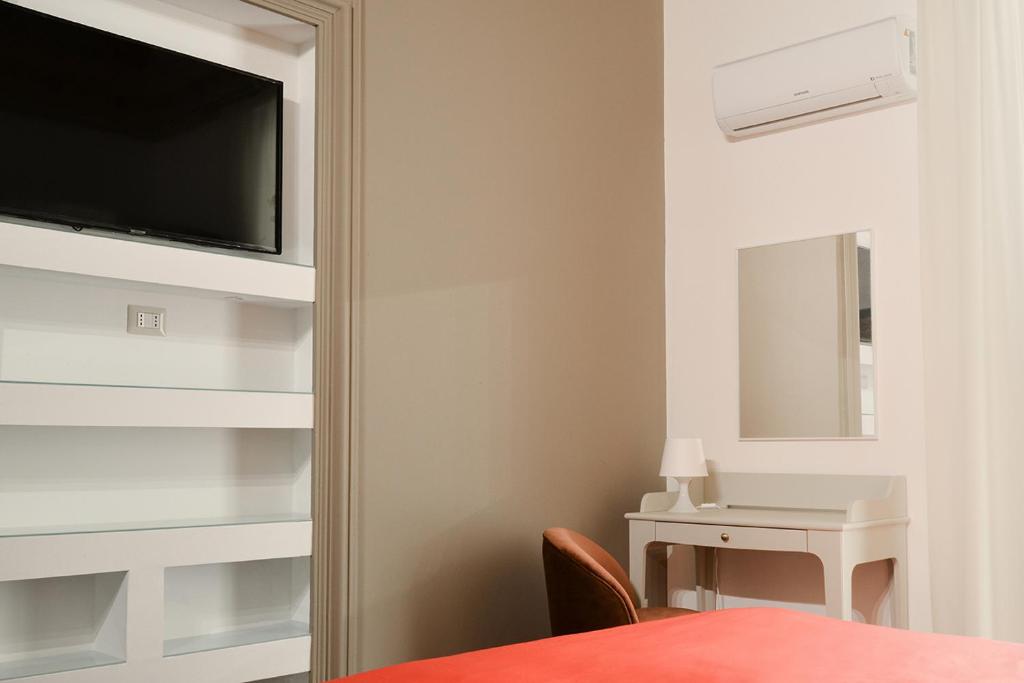 Telewizja i/lub zestaw kina domowego w obiekcie Filomena Suite Luxury Apartment