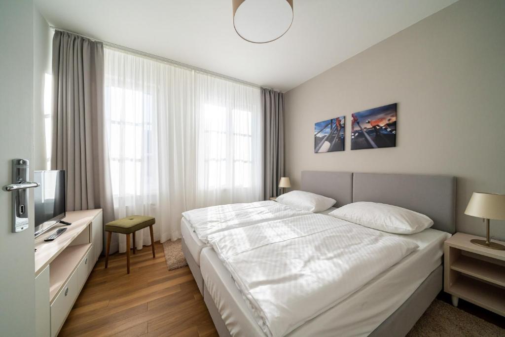 Postel nebo postele na pokoji v ubytování Haus Heidelberg