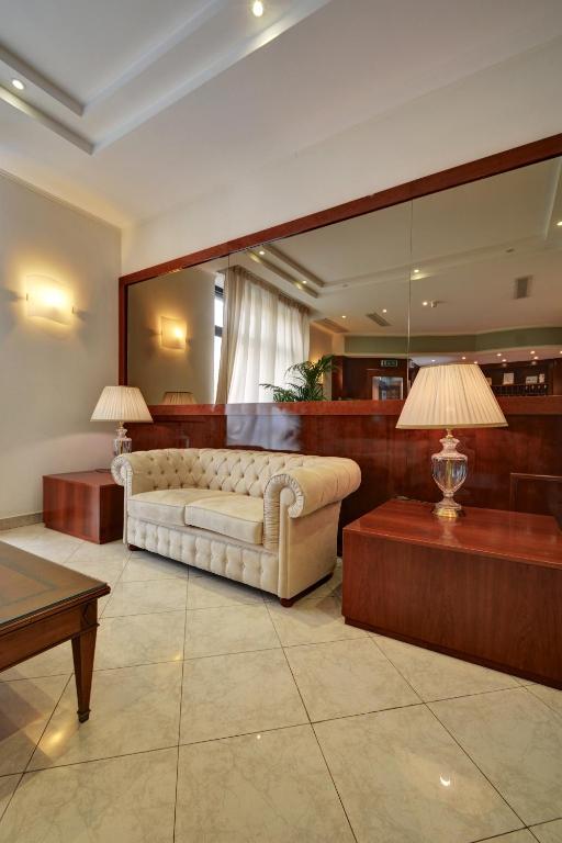 Posezení v ubytování Astor Hotel