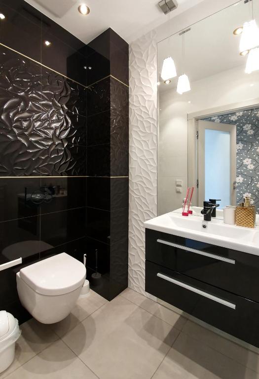 Kúpeľňa v ubytovaní Comfy Apartments - Wypoczynkowa Lux