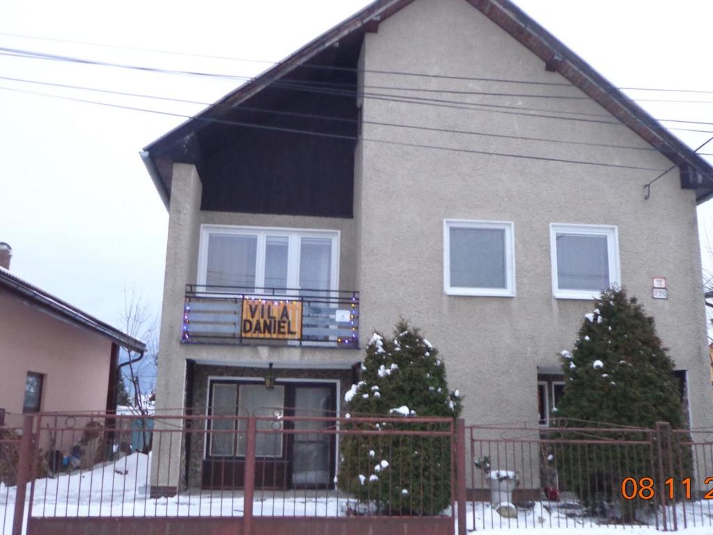 a house with a sign that reads main dance at Vila Daniel in Liptovský Mikuláš